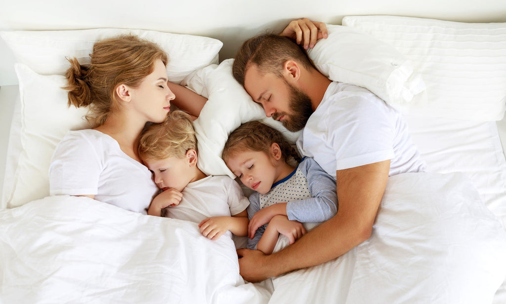 familie op bed